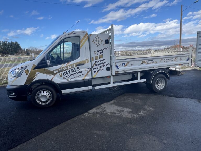 Total Covering sur Camion Benne – Vinyals Construction