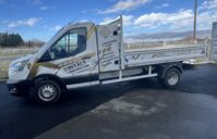 Total Covering sur Camion Benne – Vinyals Construction