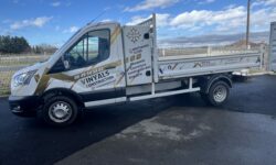 Total Covering sur Camion Benne – Vinyals Construction